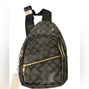 Black Patterned Backpack with Gold Accents